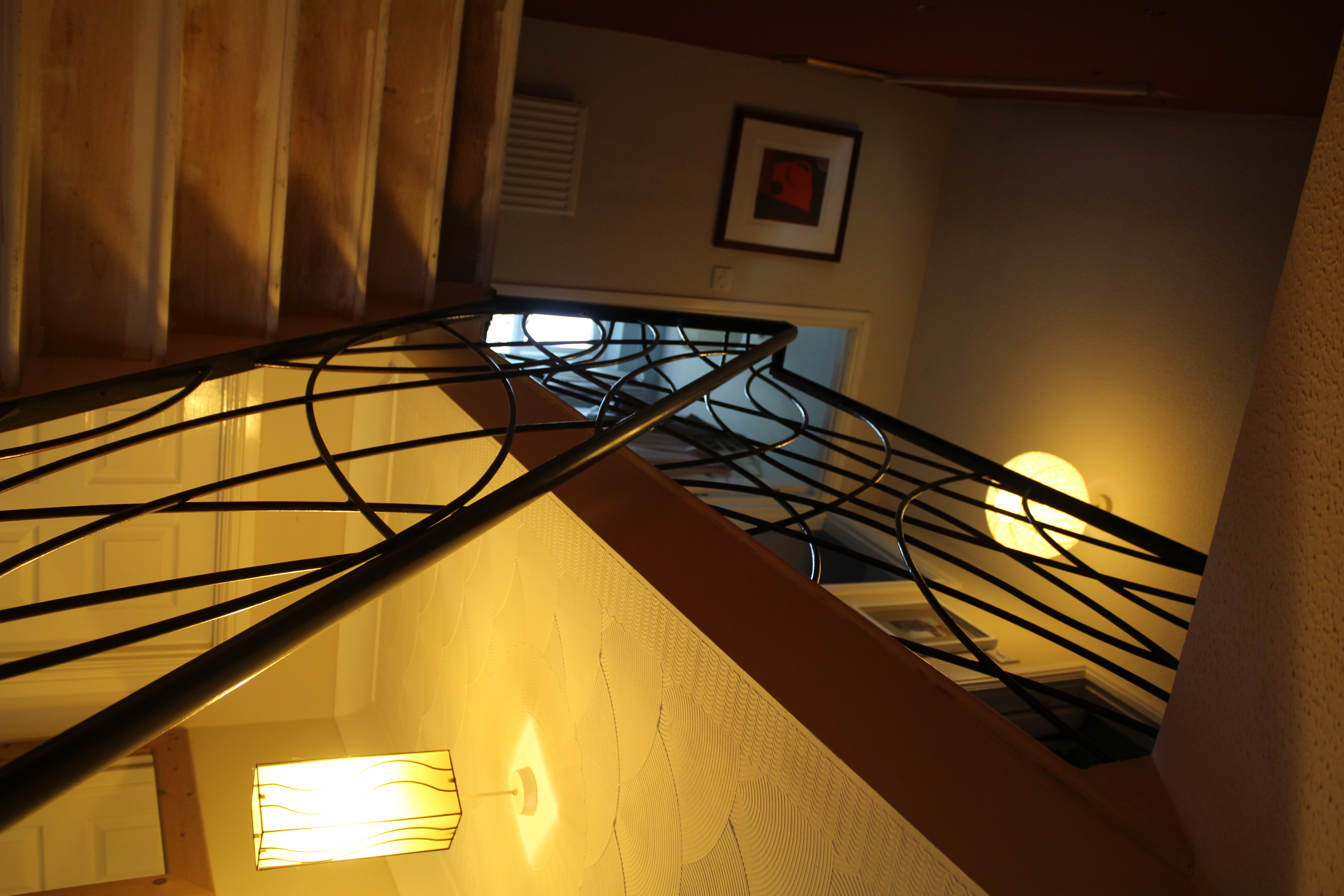 Forged organic staircase handrail Wales — Phoenix Forge