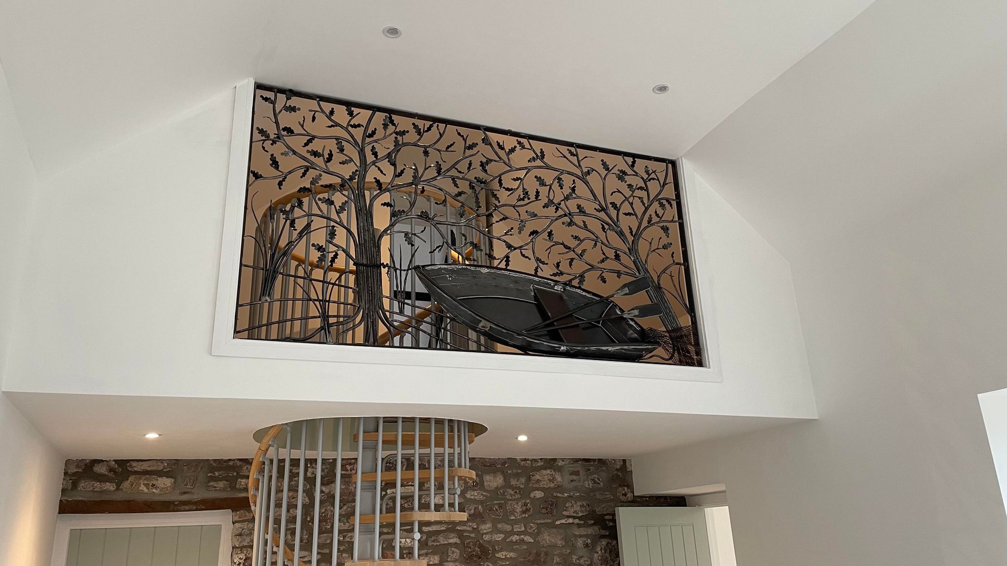 Interior forged balustrade with oak tree design Phoenix Forge