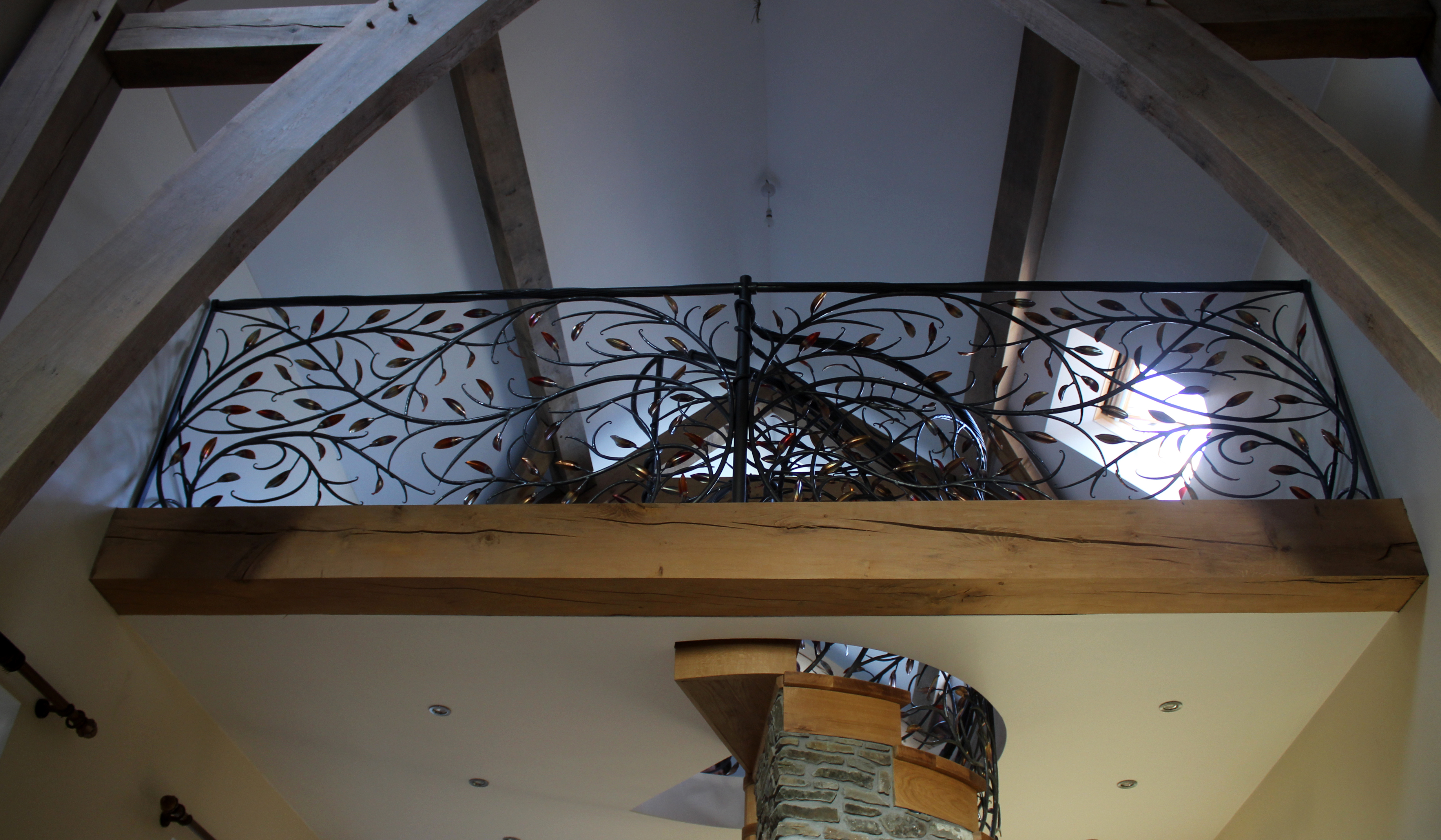 Llannon forged organic balcony with copper leaves — Phoenix Forge Wales