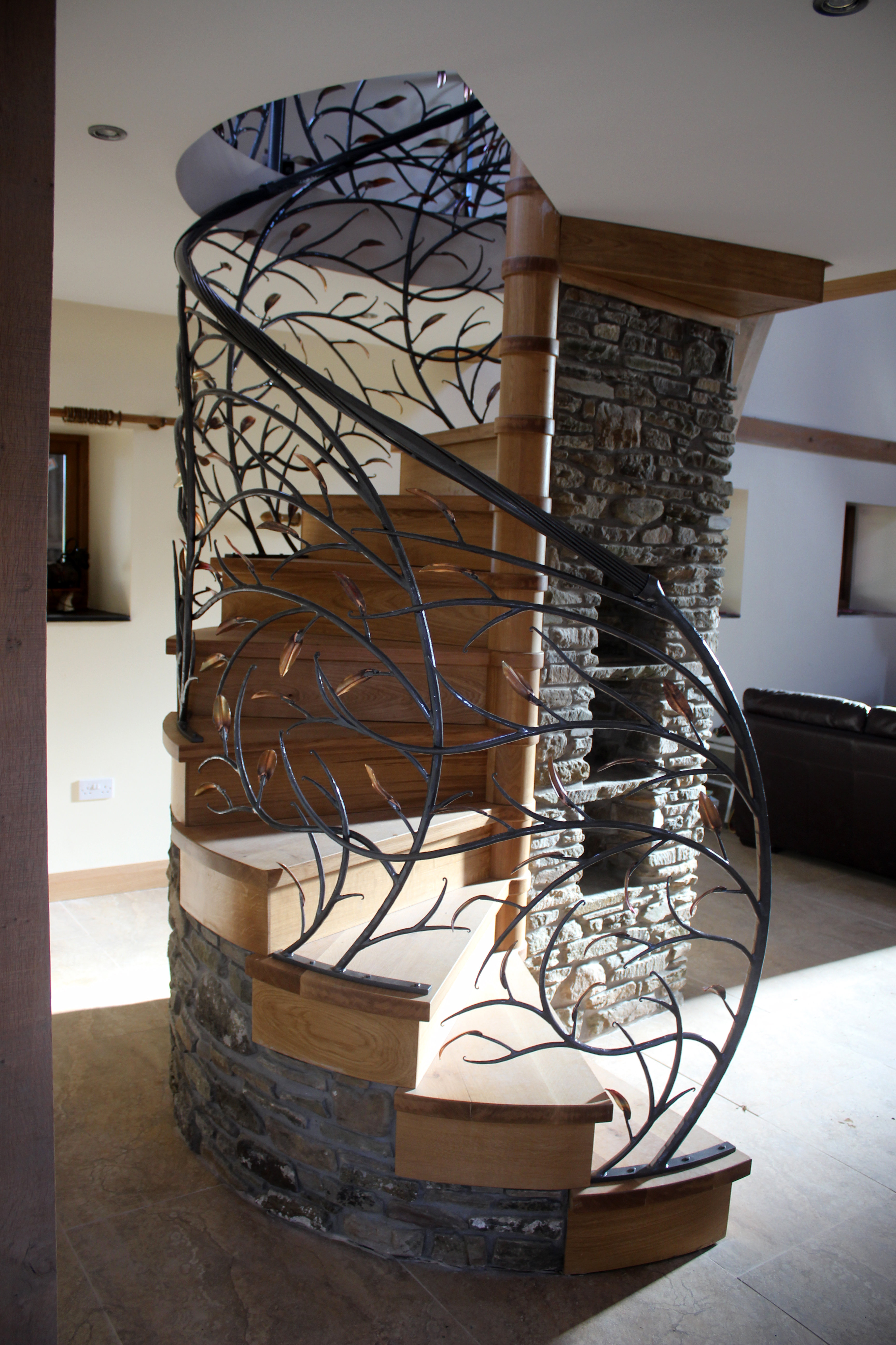 Llannon organic spiral staircase ground view Phoenix Forge Wales