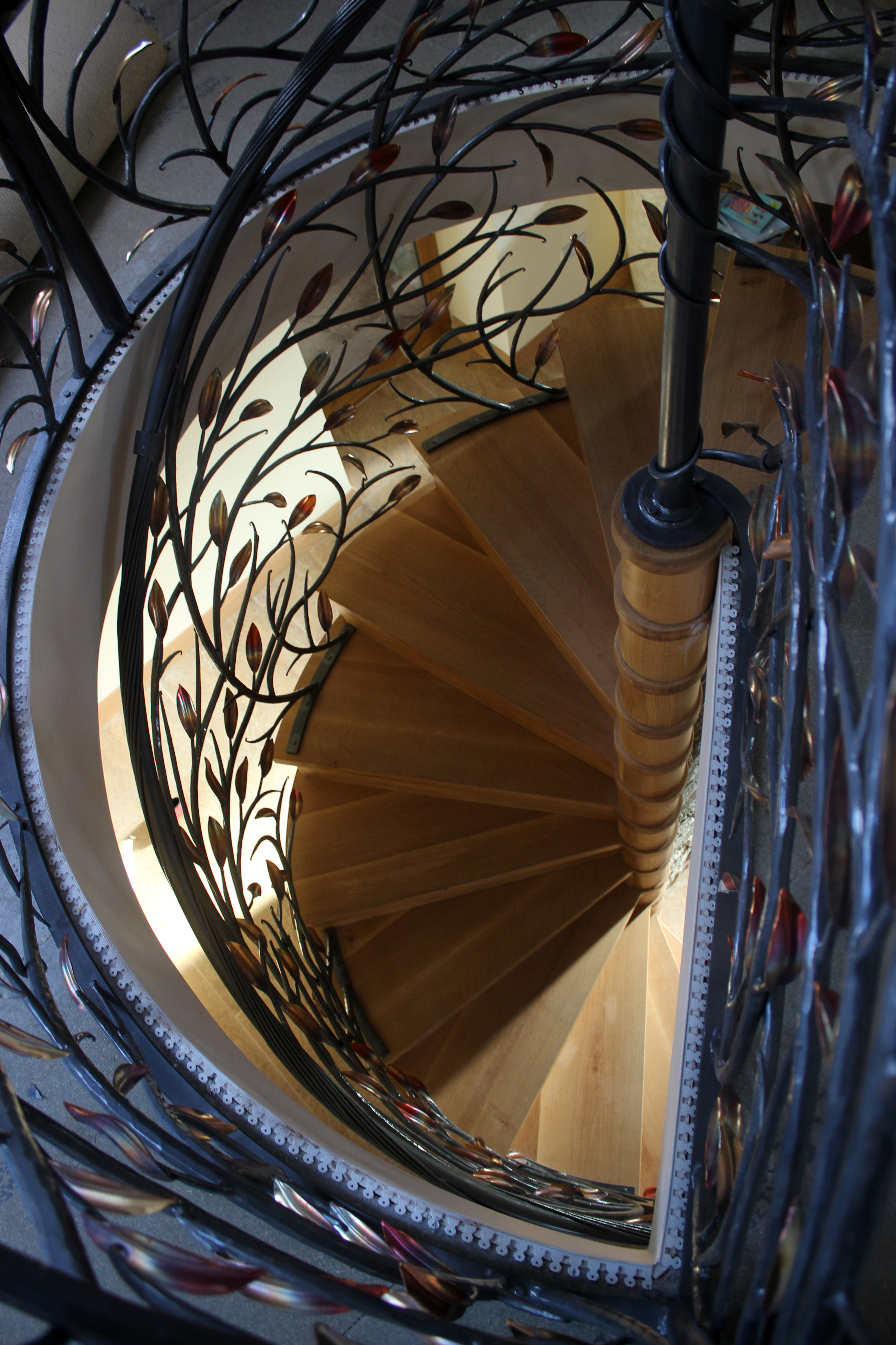 Llannon forged organic spiral staircase — view from top