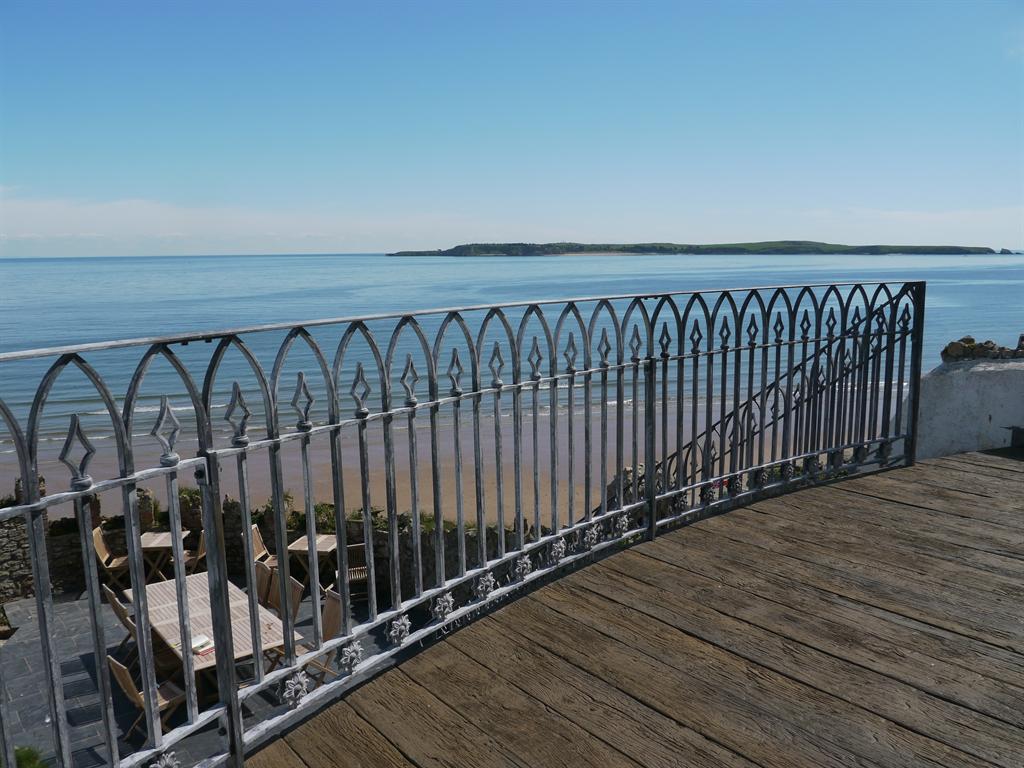 Tenby East Rock forged balcony railings overlooking the sea Wales
